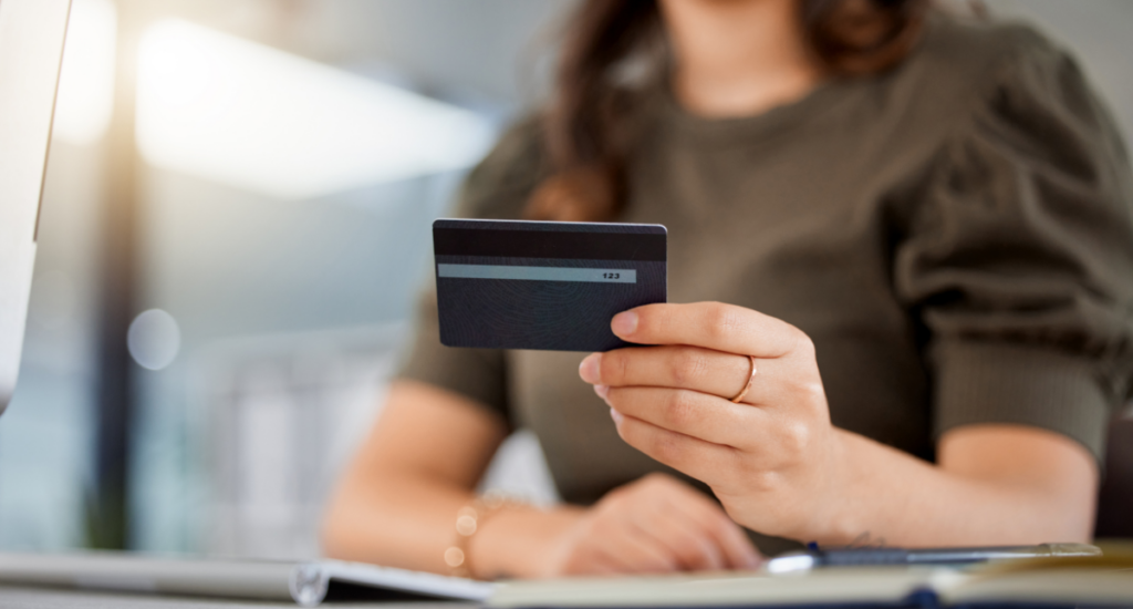 Woman Paying for a Health Coaching Certification Program